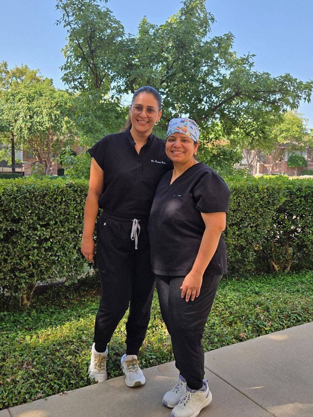Dr. Brar with a Smilecraft Dental team member